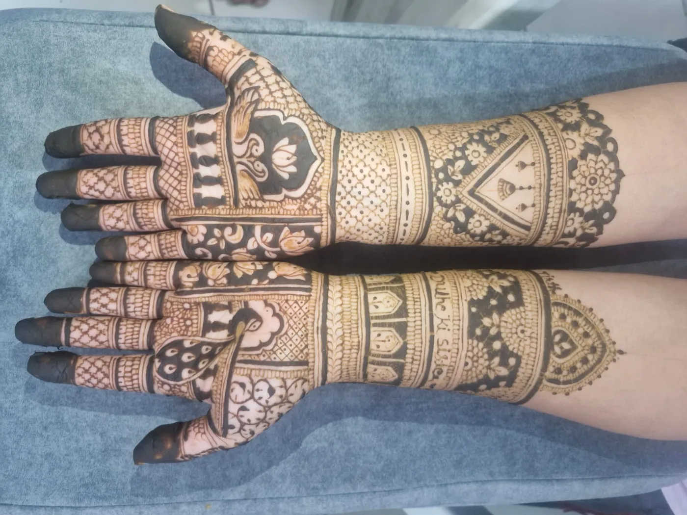 Detailed bridal hand mhendi by mhendi artist in Vastral Ahmedabad