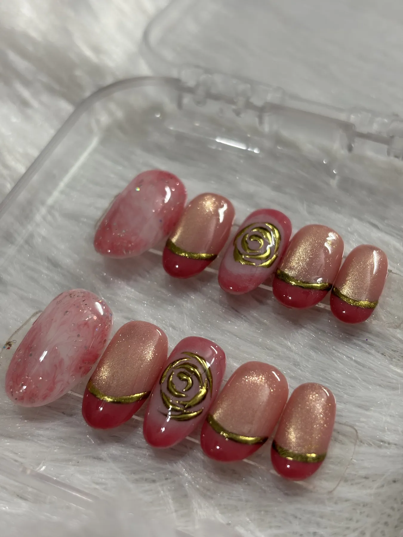 Rose and gold spiral press-on nail art Ahmedabad