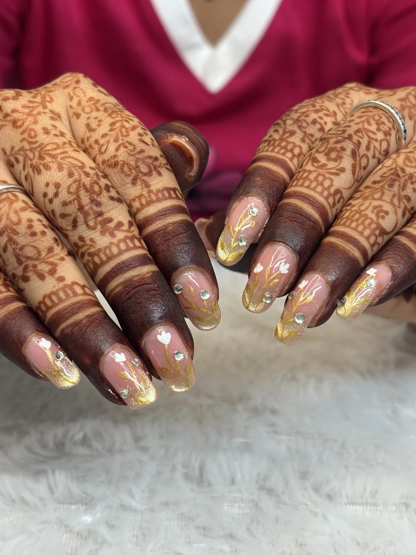Gold floral nail art with bridal mhendi in Vastral Ahmedabad