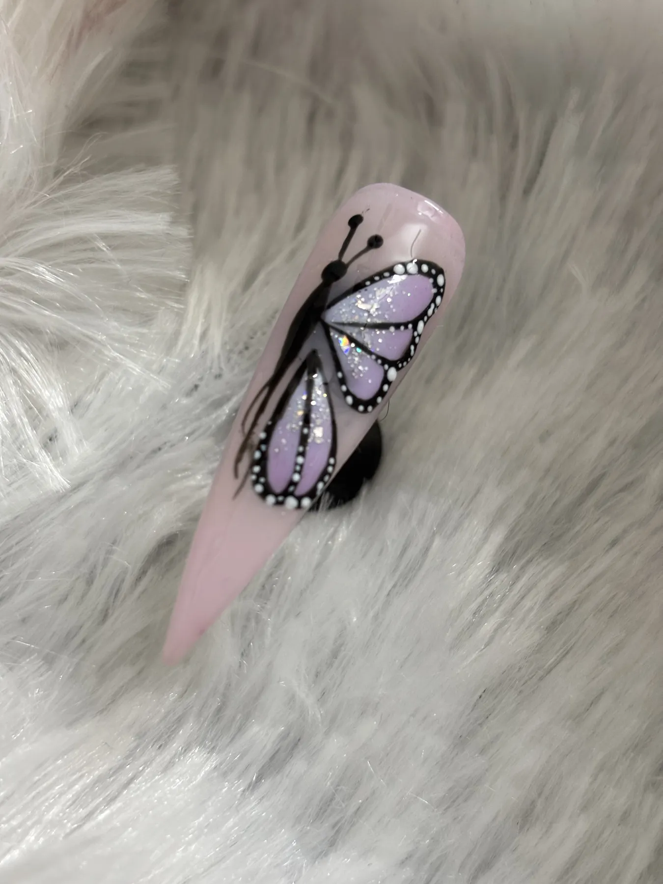 Pink stiletto nail with lilac butterfly art Ahmedabad